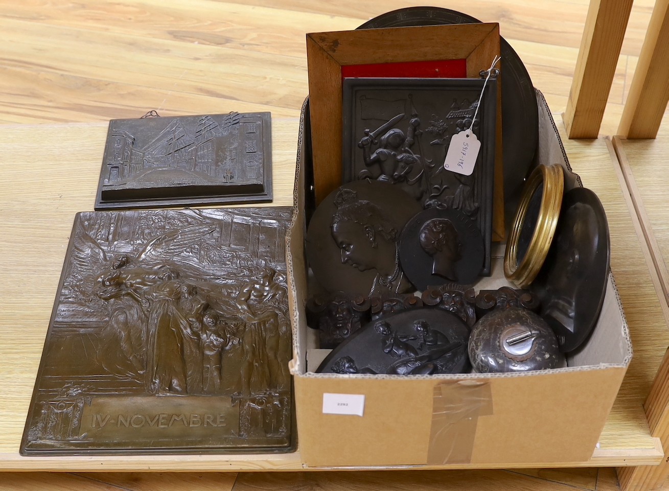 A First World War commemorative bronze plaque together with mixed collection metal and other decorative plaques etc, Commemorative plaque 39 cms high x 32 wide